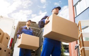 Home removals company assisting with packing household items for a stress-free move.